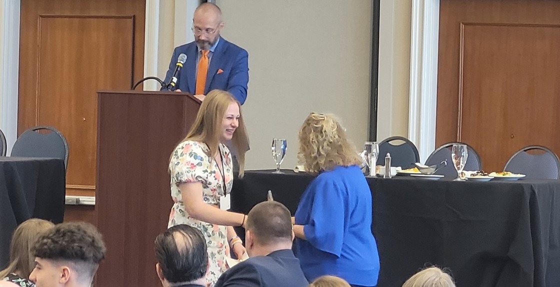 Maeve McGinnis handshake